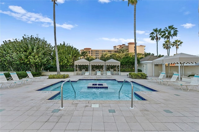 pool with a patio area