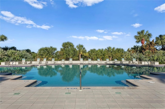 pool with a patio area