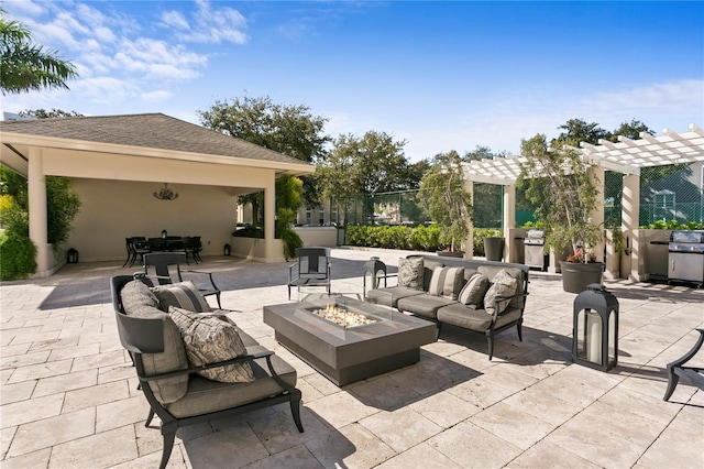 view of patio / terrace with outdoor dining area, an outdoor living space with a fire pit, grilling area, and a pergola