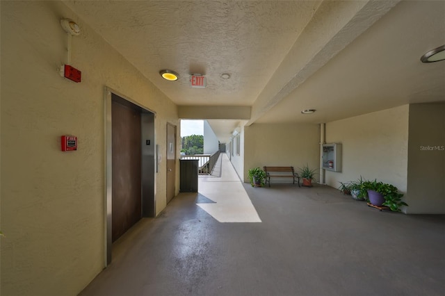 view of patio / terrace featuring elevator