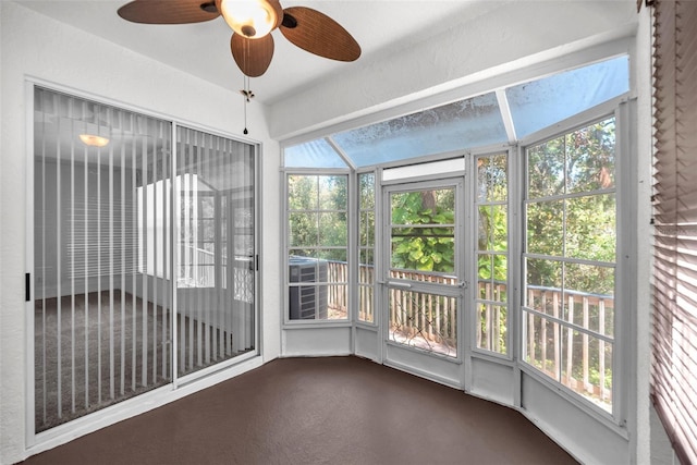 unfurnished sunroom with plenty of natural light and ceiling fan