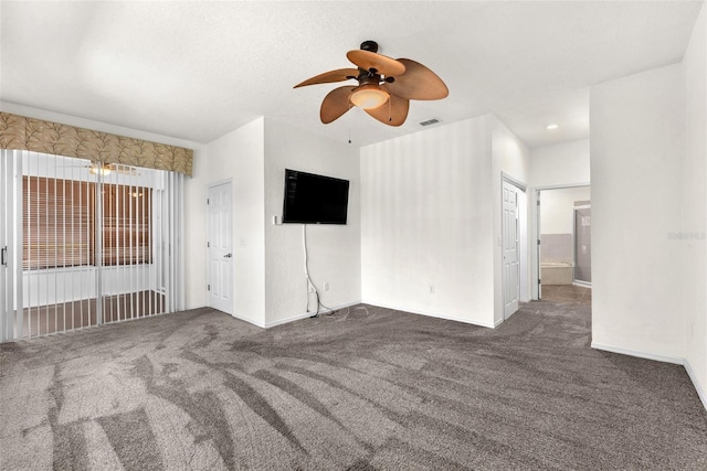 unfurnished living room featuring visible vents, baseboards, carpet, and ceiling fan