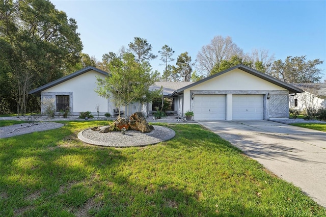 view of front facade featuring stucco siding, driveway, a front yard, and a garage