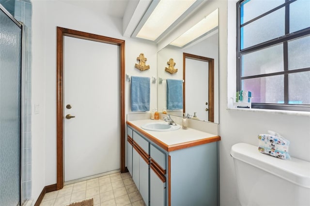 full bath with a shower with shower door, toilet, and vanity