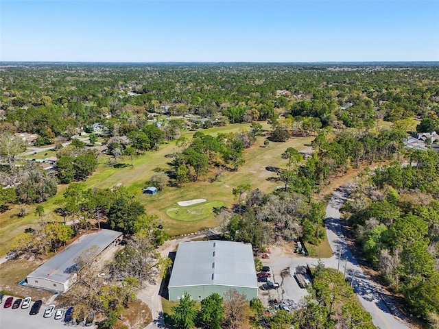 aerial view featuring a view of trees