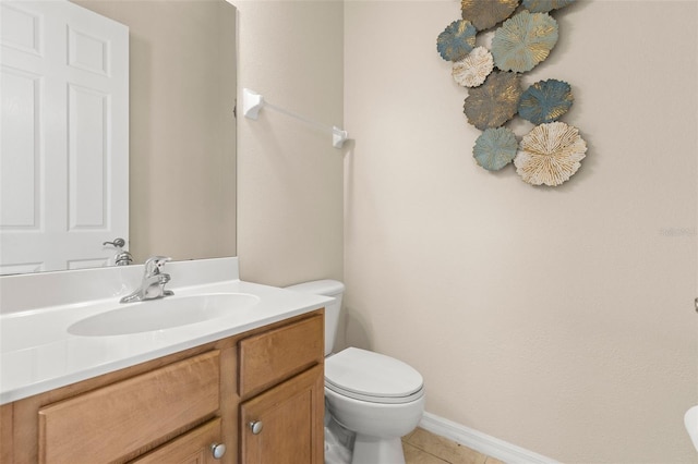 half bath featuring vanity, toilet, baseboards, and tile patterned flooring