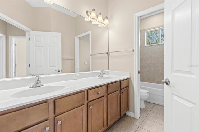 bathroom with tile patterned flooring, double vanity, a tub to relax in, and a sink