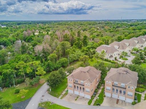 drone / aerial view with a forest view