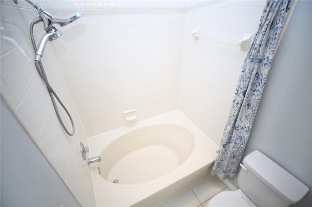 bathroom featuring toilet and shower / tub combo with curtain