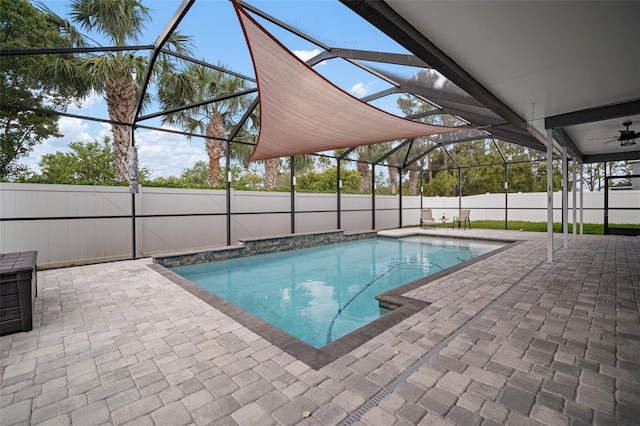 view of pool with a patio, a fenced in pool, and a lanai