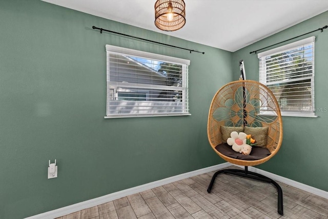 sitting room featuring wood finished floors and baseboards