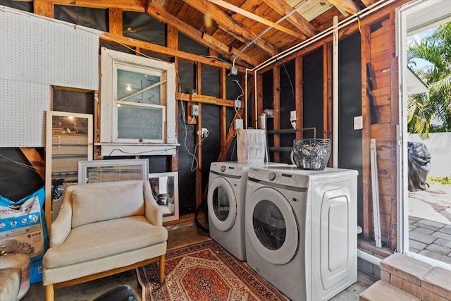 laundry area with laundry area and independent washer and dryer