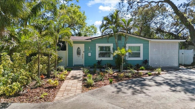 view of front of home with fence