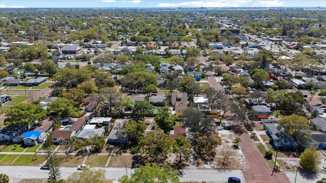 birds eye view of property with a residential view