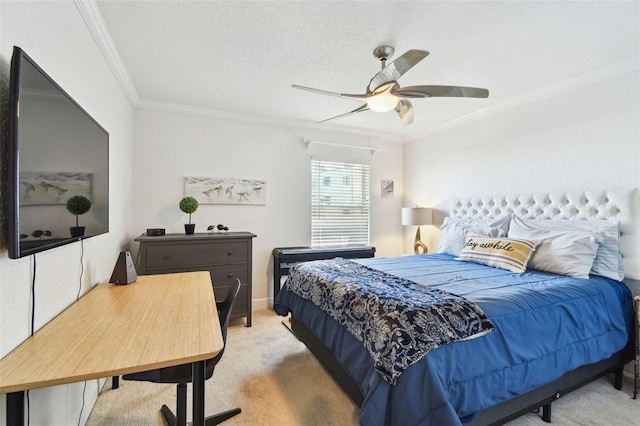 carpeted bedroom with a textured ceiling, ceiling fan, and crown molding