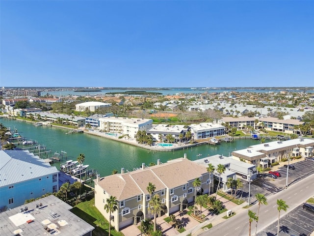 bird's eye view featuring a residential view and a water view