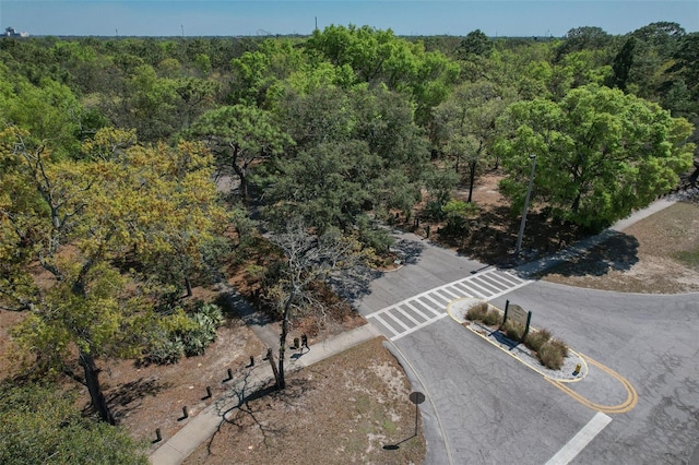 aerial view featuring a view of trees