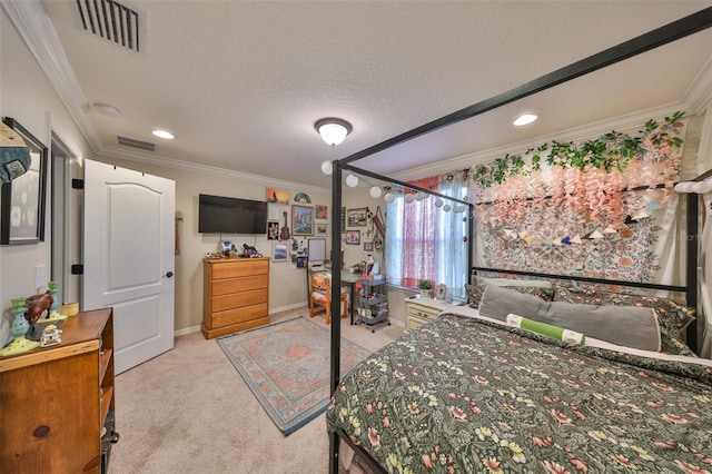 bedroom with light carpet, visible vents, a textured ceiling, and crown molding