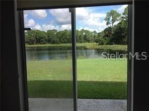 entryway featuring a water view