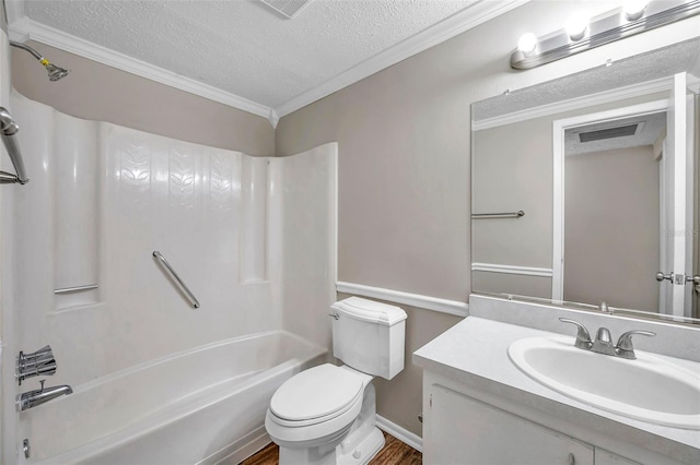 full bath featuring toilet, ornamental molding, shower / bathtub combination, a textured ceiling, and vanity