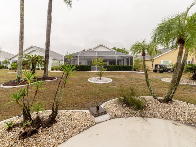 view of yard featuring a lanai