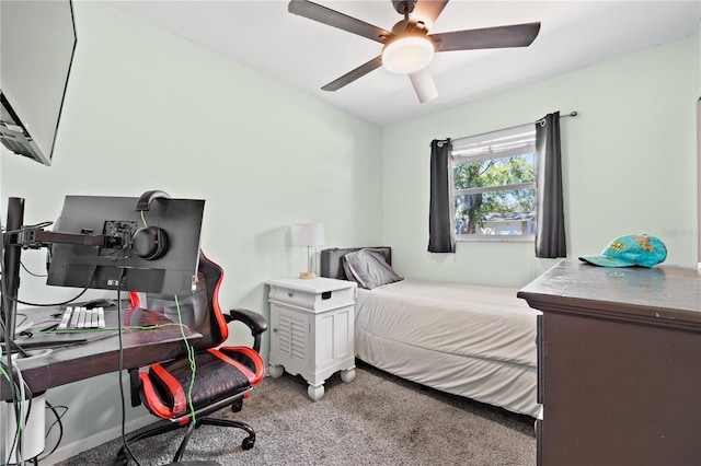 bedroom featuring ceiling fan and carpet flooring