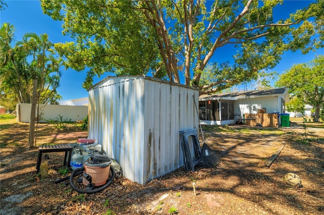 view of shed featuring a sunroom