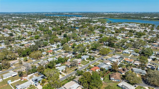 bird's eye view featuring a residential view and a water view