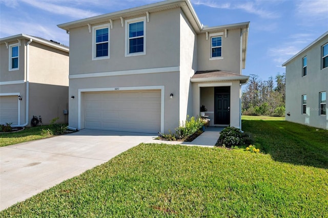 traditional-style house with a front lawn, an attached garage, driveway, and stucco siding