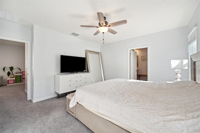 bedroom featuring visible vents, baseboards, light colored carpet, and ceiling fan