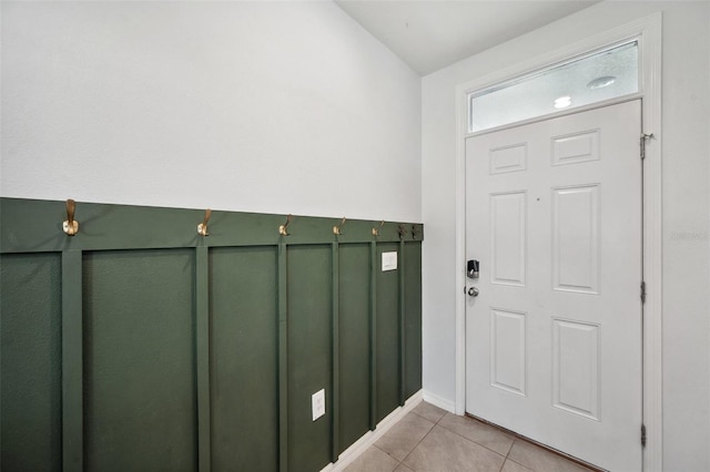 entrance foyer featuring light tile patterned floors