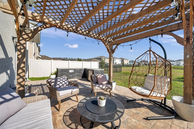 view of patio / terrace with a fenced backyard, a pergola, and an outdoor hangout area