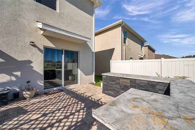 view of patio with fence