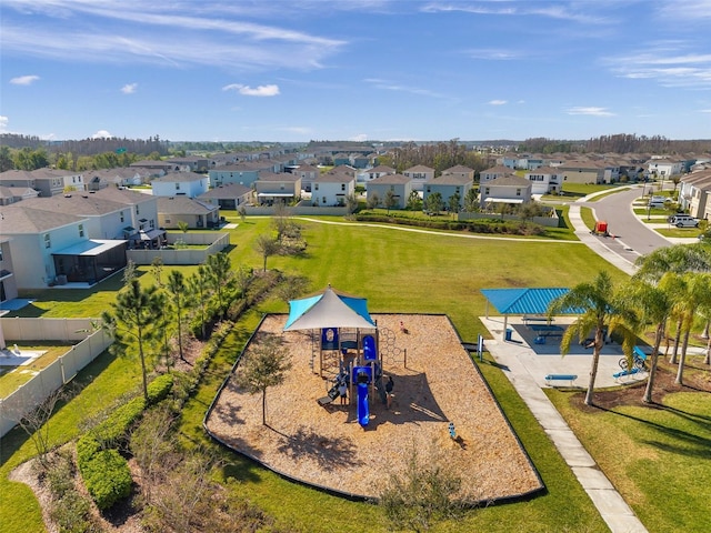 birds eye view of property with a residential view