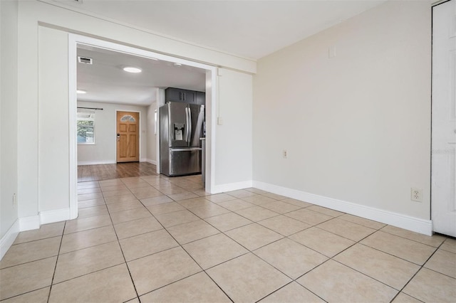 10309 108th Ave, Largo, FL 33773 - spare room with light tile patterned flooring, baseboards, and visible vents