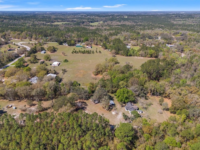 aerial view featuring a forest view