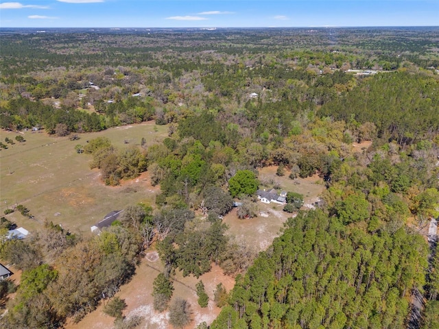bird's eye view featuring a view of trees