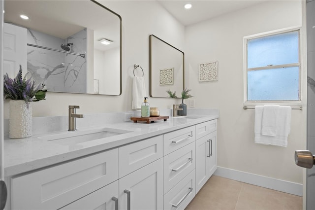 2008 41st St W, Bradenton, FL 34205 - full bathroom with a marble finish shower, double vanity, recessed lighting, a sink, and tile patterned flooring