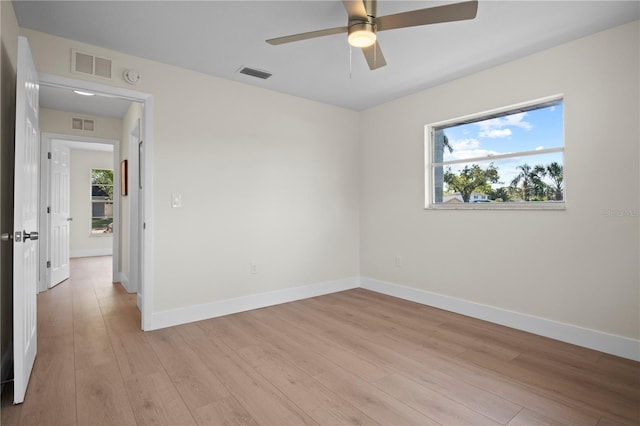 2008 41st St W, Bradenton, FL 34205 - unfurnished room featuring a wealth of natural light, visible vents, light wood-style floors, and ceiling fan