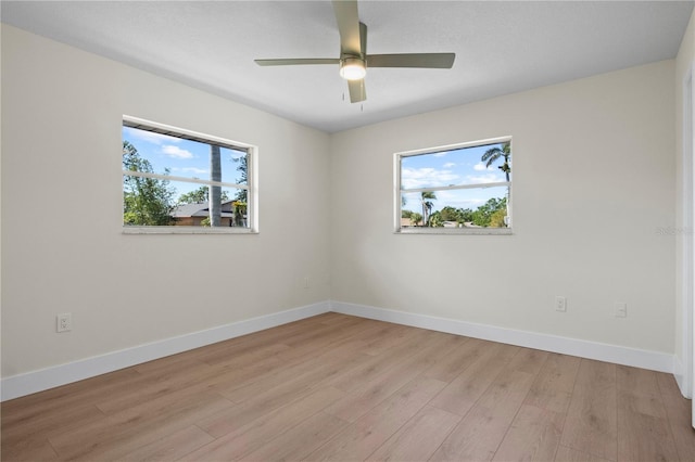 2008 41st St W, Bradenton, FL 34205 - unfurnished room featuring baseboards, light wood-style floors, and a ceiling fan