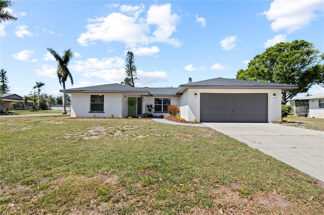 2008 41st St W, Bradenton, FL 34205 - ranch-style house featuring stucco siding, a garage, concrete driveway, and a front lawn