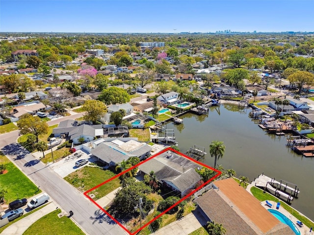 aerial view with a residential view and a water view