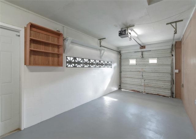 garage featuring a garage door opener