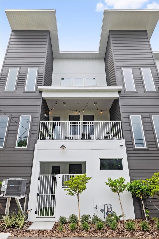 view of building exterior with cooling unit