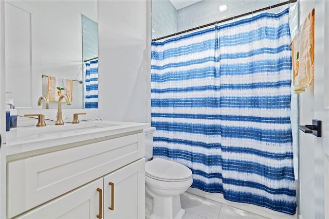 full bathroom featuring tile patterned floors, curtained shower, toilet, and vanity