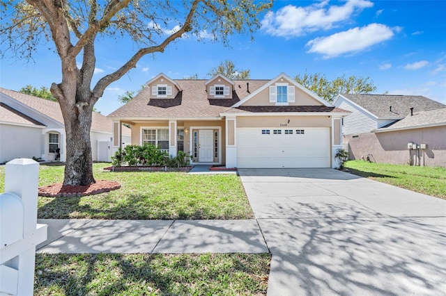 view of front facade featuring roof with shingles, stucco siding, concrete driveway, a front lawn, and a garage