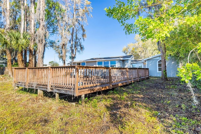 view of yard featuring a wooden deck