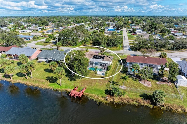 aerial view featuring a residential view and a water view