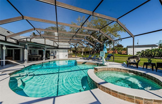 view of pool featuring a patio area, a lanai, and a pool with connected hot tub