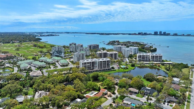 drone / aerial view with a view of city and a water view